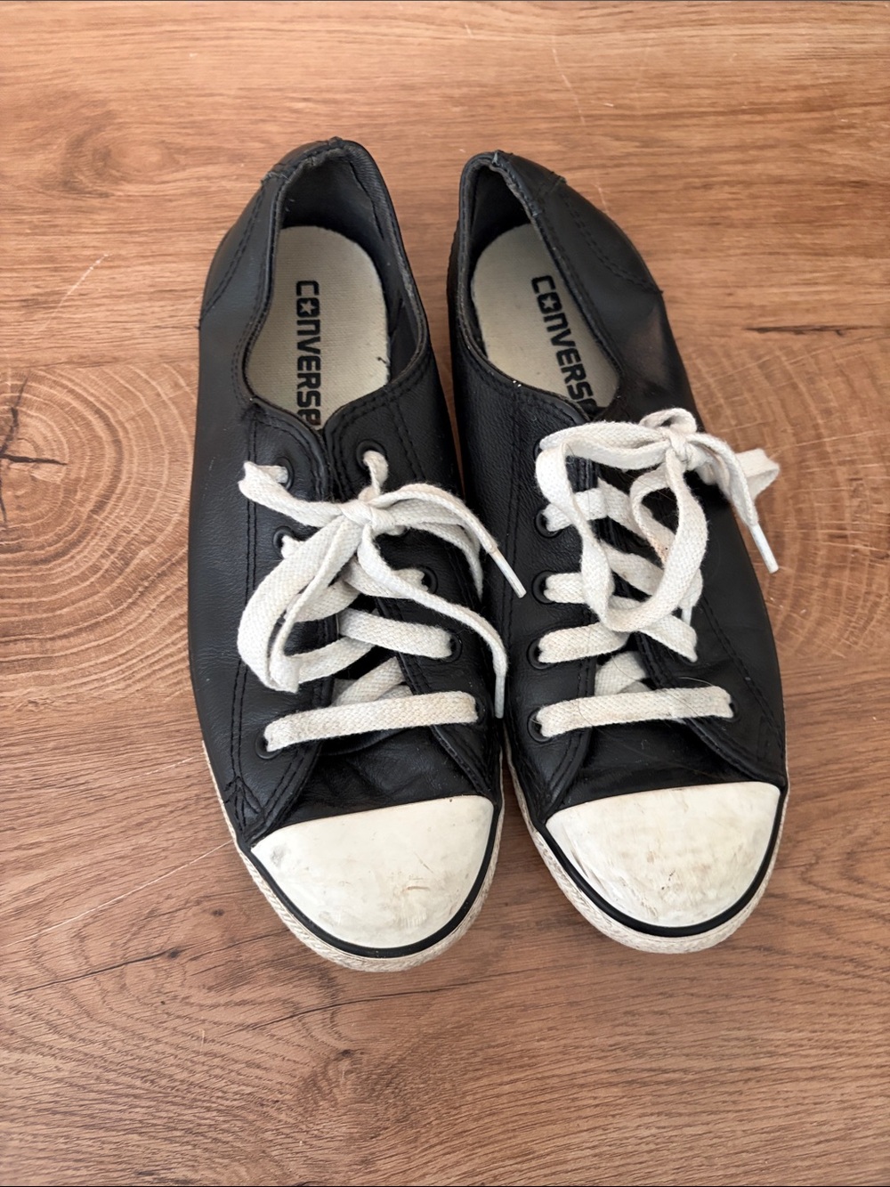 Converse Black Leather Low-Top Sneakers with White Laces and Toe Caps